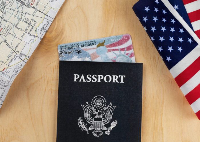 flat-lay-green-card-passport-arrangement-scaled